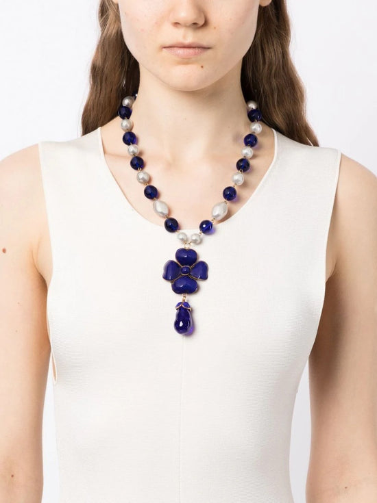 Chanel Gripoix Camellia pendant necklace with colorful glass flower charm on a delicate chain, elegant jewelry accessory.