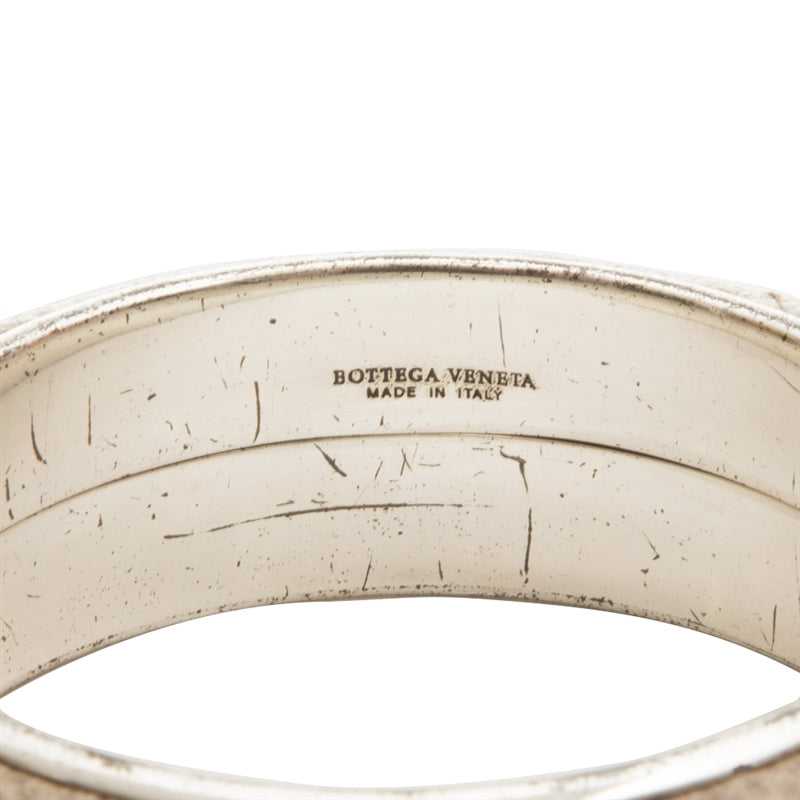 Bottega Veneta cuff bracelet with smooth leather and signature intrecciato weave design, stylish jewelry accessory.