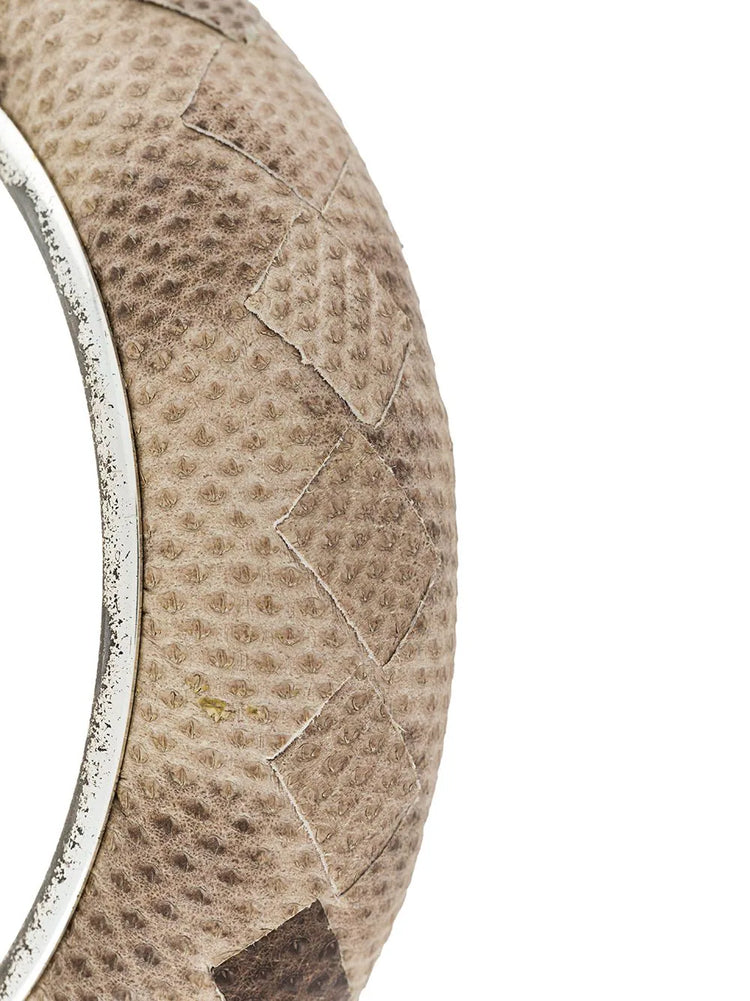 Bottega Veneta cuff bracelet with sleek, minimalist design in smooth leather, stylish accessory for elegant wrist wear.