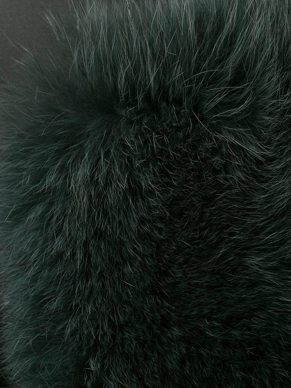 Burberry Prorsum black leather jacket with collar, button-front fastening, cropped silhouette, long sleeves, and oversized fur-trimmed front patch pockets.