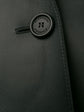 Burberry Prorsum black leather jacket with collar, button-front fastening, cropped silhouette, long sleeves, and oversized fur-trimmed front patch pockets.