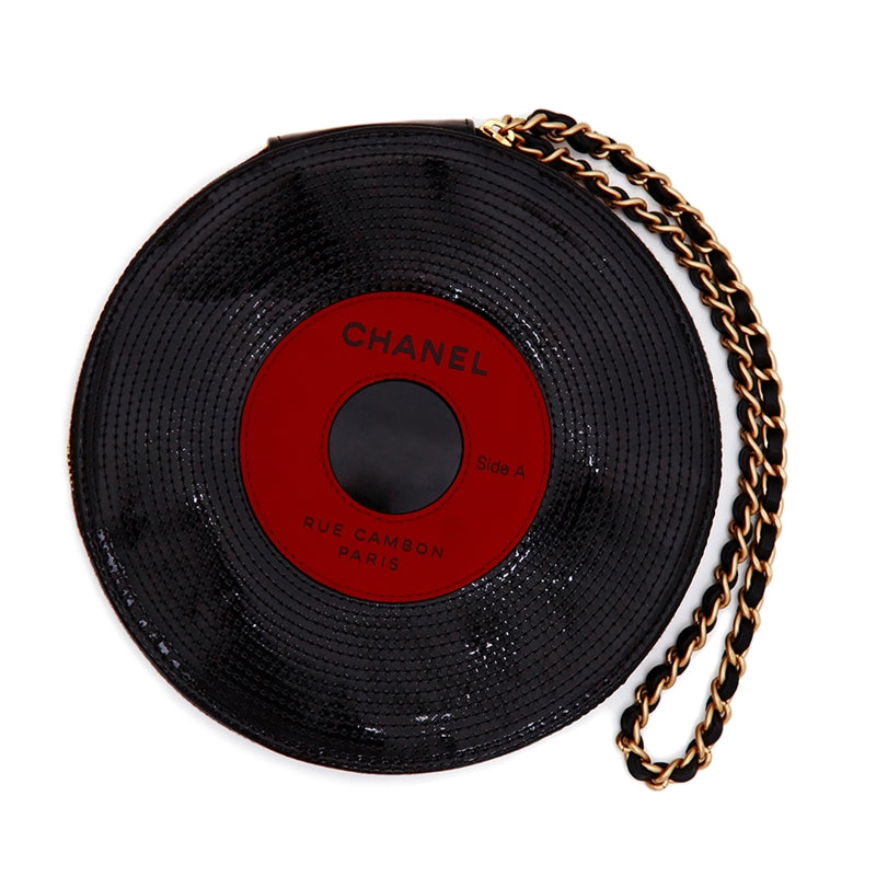 Chanel music record clutch bag in black with gold chain strap, stylish accessory with a sleek, compact design for music lovers.