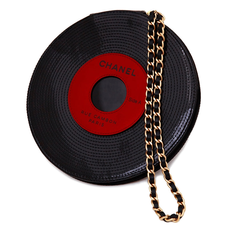 Chanel music record clutch bag with quilted design and chain strap, stylish accessory for music lovers and fashion enthusiasts.