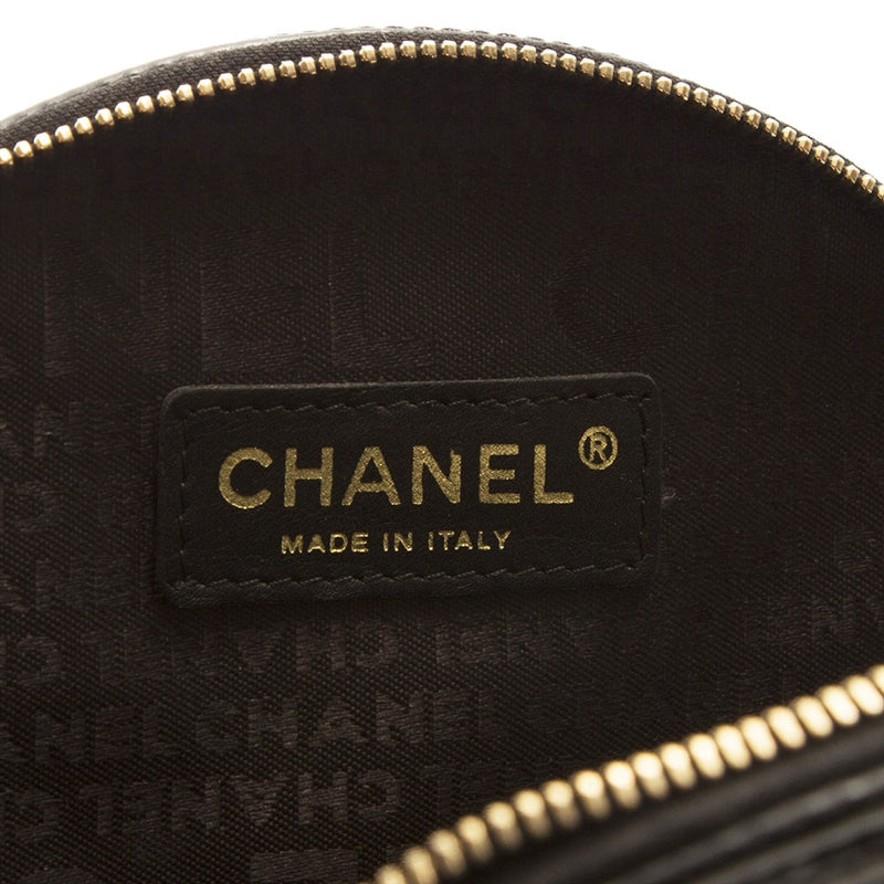 Chanel music record clutch bag with sleek black design and gold accents, perfect for stylish music enthusiasts.