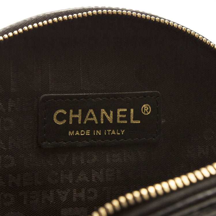Chanel music record clutch bag with sleek black design and gold accents, perfect for stylish music enthusiasts.