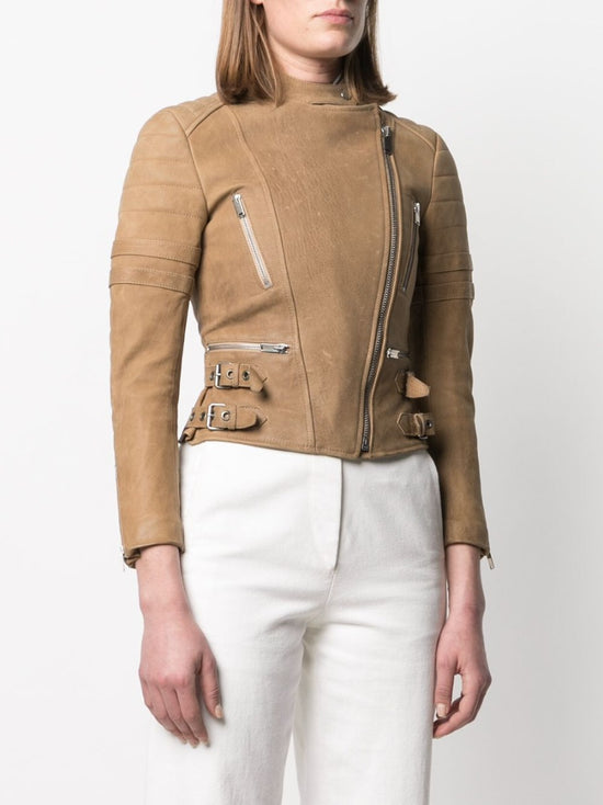 Celine camel leather biker jacket with asymmetric zip fastening, snap-button collar, quilted shoulder panels, silver-tone zip pockets, buckle waist details and fitted cropped silhouette.