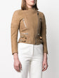 Celine camel leather biker jacket with asymmetric zip fastening, snap-button collar, quilted shoulder panels, silver-tone zip pockets, buckle waist details and fitted cropped silhouette.