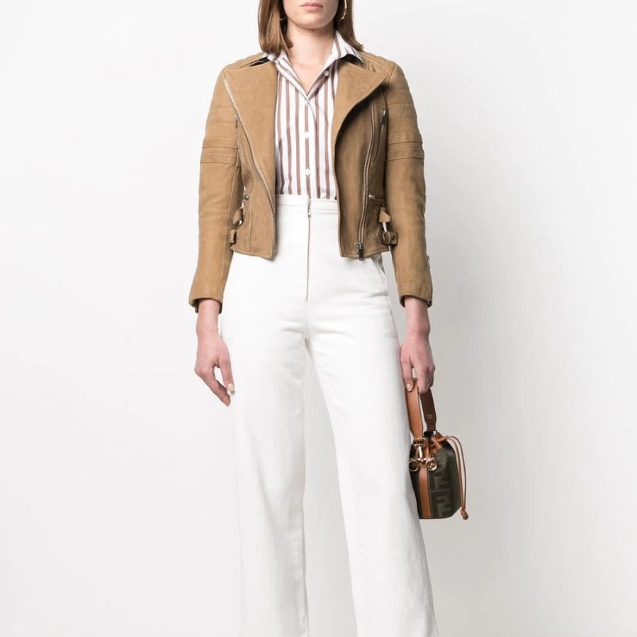 Celine camel leather biker jacket with asymmetric zip fastening, snap-button collar, quilted shoulder panels, silver-tone zip pockets, buckle waist details and fitted cropped silhouette.