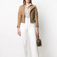 Celine camel leather biker jacket with asymmetric zip fastening, snap-button collar, quilted shoulder panels, silver-tone zip pockets, buckle waist details and fitted cropped silhouette.