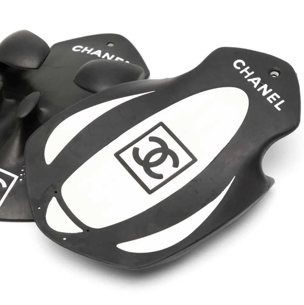 Chanel limited edition black swimming paddles pair, shown from a side angle