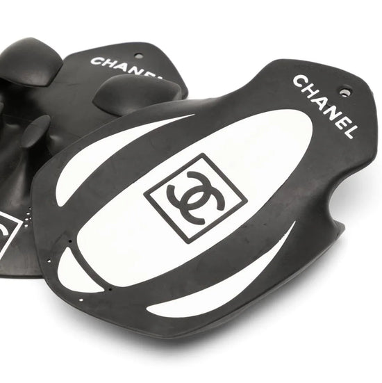 Chanel limited edition black swimming paddles pair, shown from a side angle