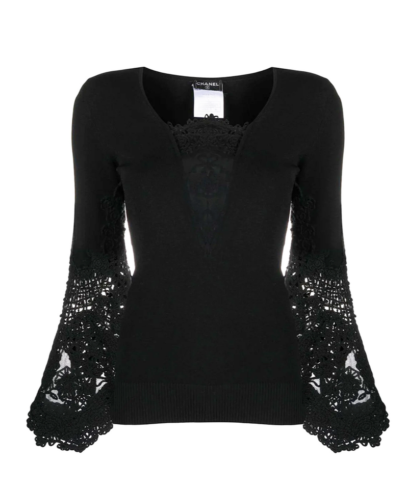 Chanel black crochet sleeve jumper, front view showing V-neckline and fitted silhouette