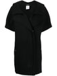 Black Chanel short-sleeved knit gilet, stylish blazer and jacket hybrid, featuring a sleek design and classic Chanel detailing.