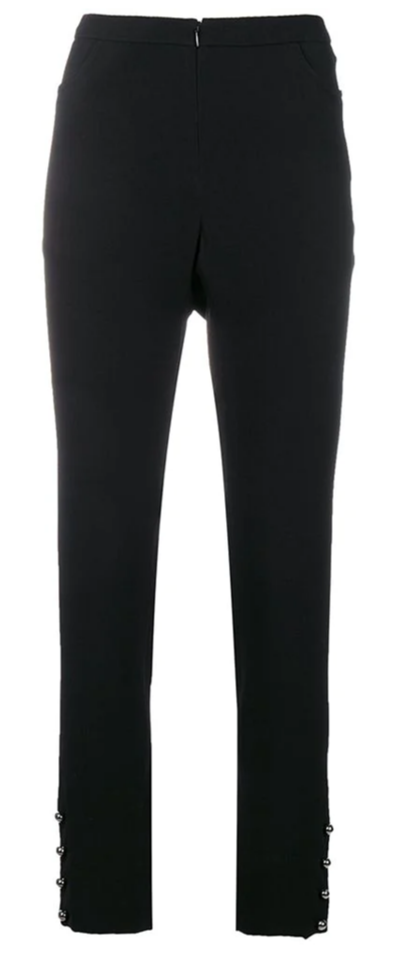 Black silk Chanel trousers featuring a tailored fit and sleek design, ideal for elegant and sophisticated style.
