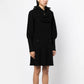 Black textured knit Chanel dress with a collar, showcasing elegant, classic design perfect for sophisticated occasions.