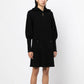 Black Chanel knit collared dress with textured fabric, tailored fit, and classic design, perfect for elegant occasions.