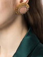 Chanel coral cabochon earrings, close-up detail of rhinestone and star motif