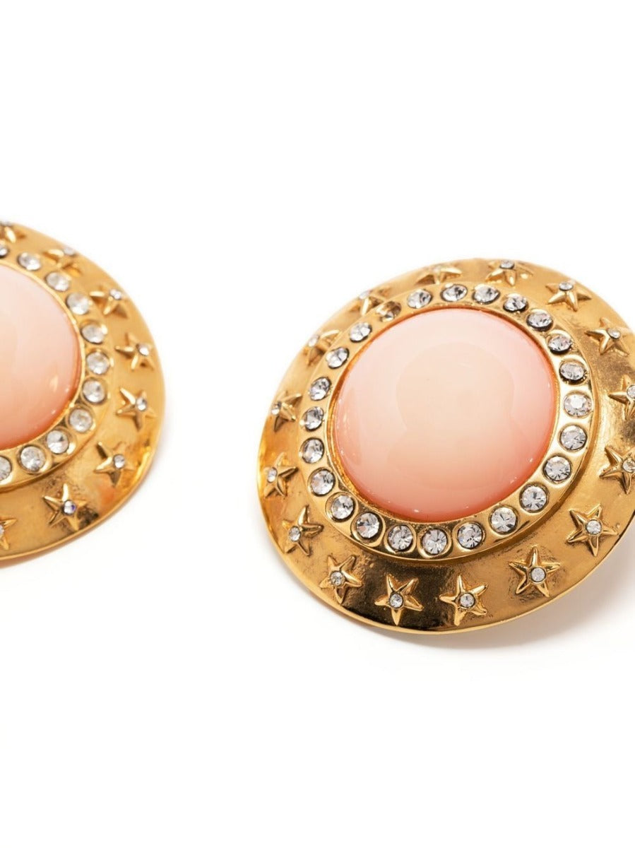Chanel coral cabochon rhinestone earrings, side view showing cabochon setting
