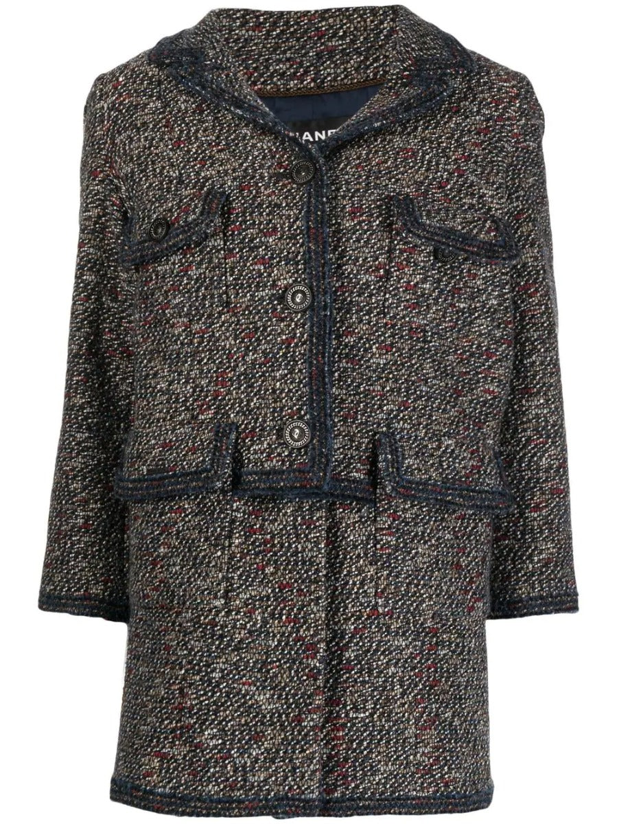 Chanel layered tweed jacket, stylish blazer with textured fabric, classic design, and elegant tailoring for sophisticated fashion.