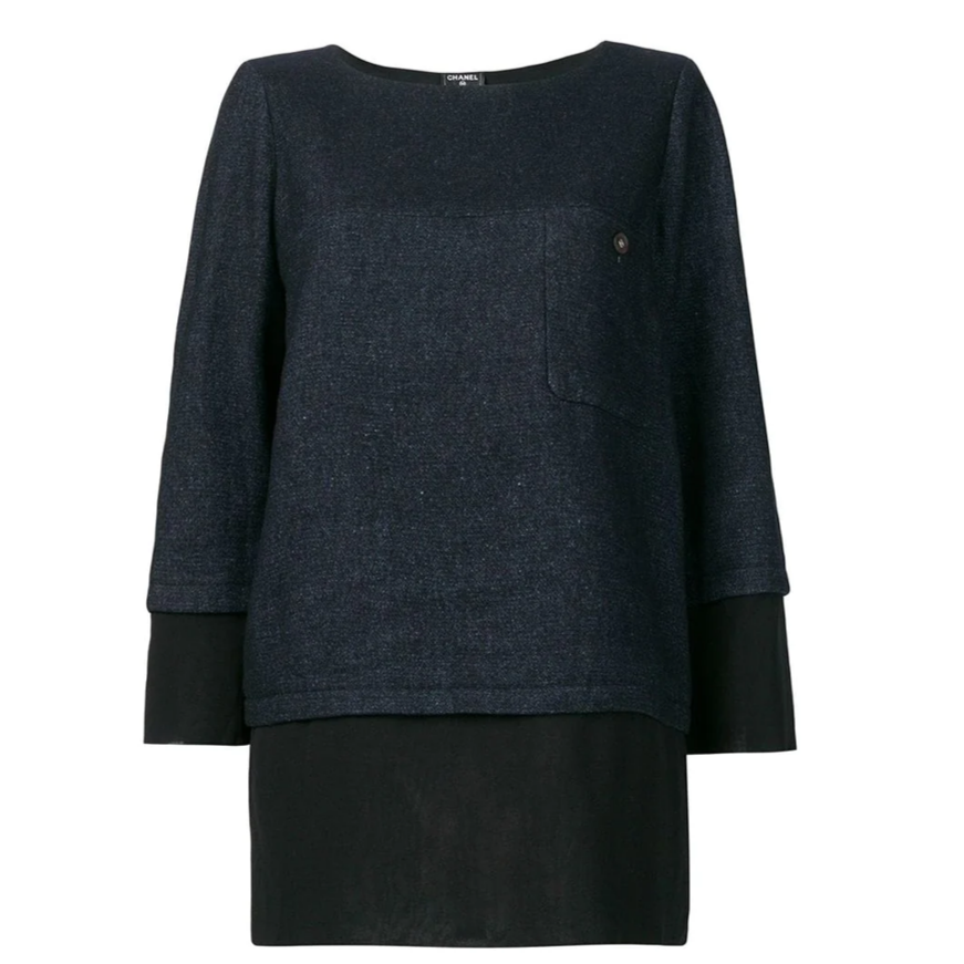 Chanel layered straight blouse with multiple fabric panels, long sleeves, and classic design, shown on a mannequin.