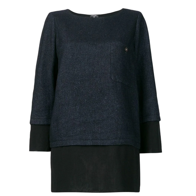 Chanel layered straight blouse with multiple fabric panels, long sleeves, and classic design, shown on a mannequin.