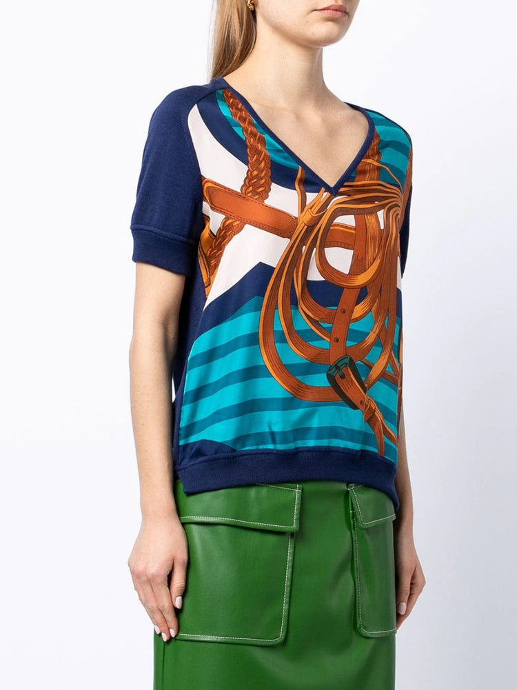 Hermès navy bridle print silk top featuring a stylish blouse design with elegant horse-themed pattern.