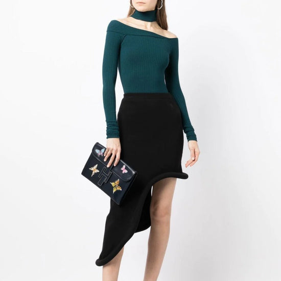 Hermès Butterfly Jige Elan PM clutch in black box leather with colorful butterfly design, stylish and elegant accessory.
