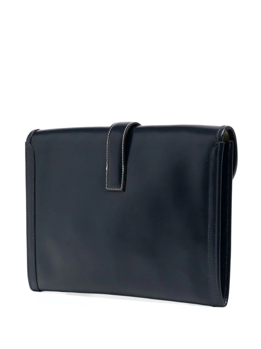 Hermès Butterfly Jige Elan PM clutch in black box leather, featuring customized design and elegant craftsmanship.