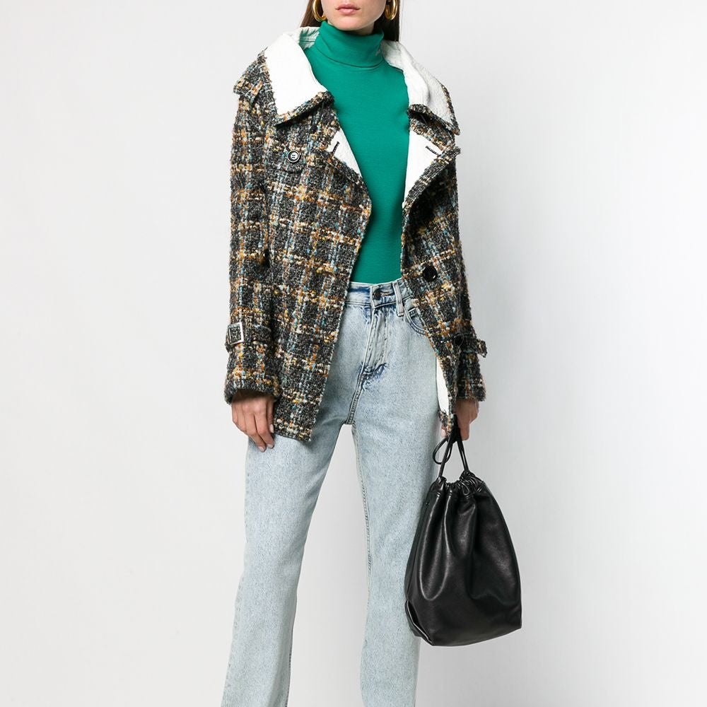Vintage Comme Des Garçons double-breasted tweed jacket, stylish blazer with classic tailored fit and textured fabric.