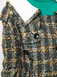 Vintage Finds Comme Des Garçons double-breasted tweed jacket with peak lapels and button closure, displayed on a hanger.