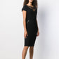 Black Nina Ricci shift dress, sleeveless design with a fitted silhouette, showcasing elegant style and smooth fabric.