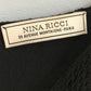 Nina Ricci black shift dress from Other Designers, shown on a hanger with label visible, featuring classic silhouette and sleek fabric.