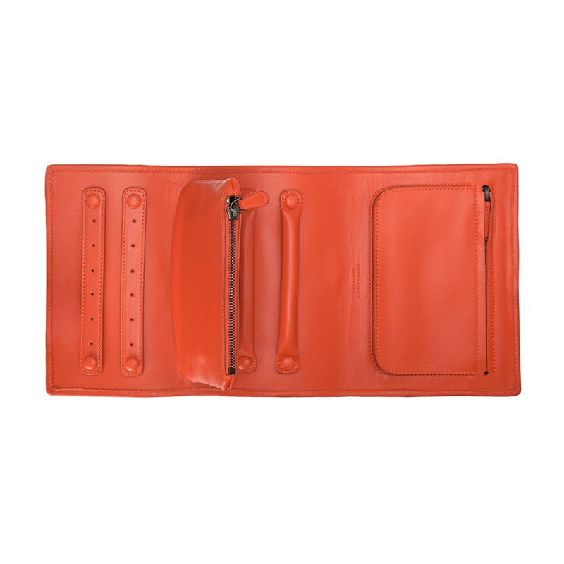 Red Bottega Veneta Intrecciato leather jewelry pouch, small accessories with woven design and compact storage for jewelry.