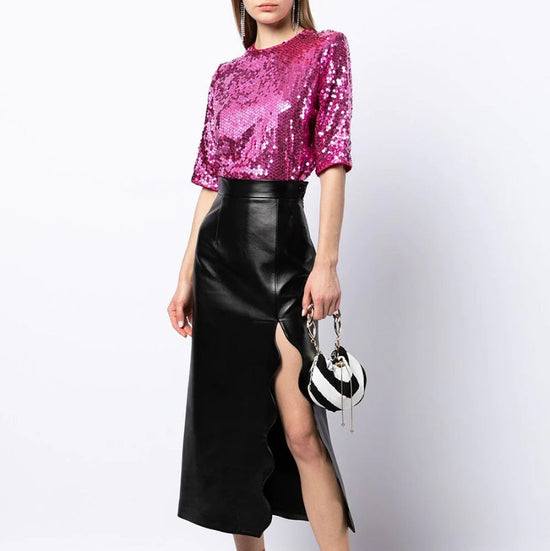 Yves Saint Laurent Rive Gauche sequin top with shimmering silver sequins, sleeveless design, and round neckline.