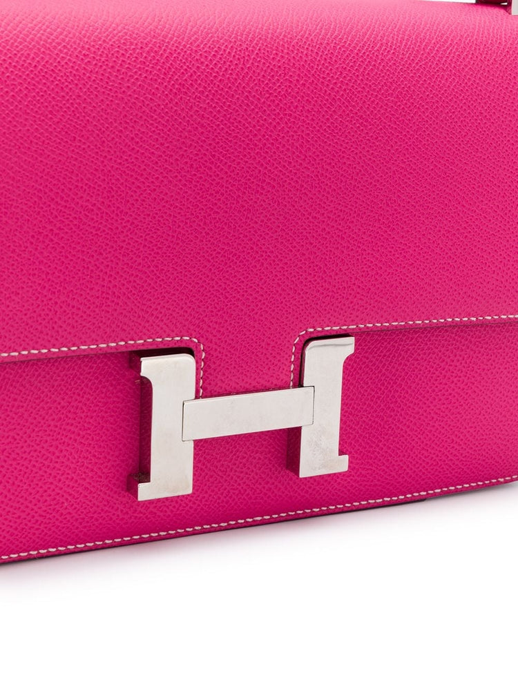 Hermès Tyrien Pink Epsom Leather Constance Elan shoulder bag with gold hardware, featuring a structured design and top handle.