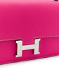 Hermès Tyrien Pink Epsom Leather Constance Elan shoulder bag with gold hardware, featuring a structured design and top handle.