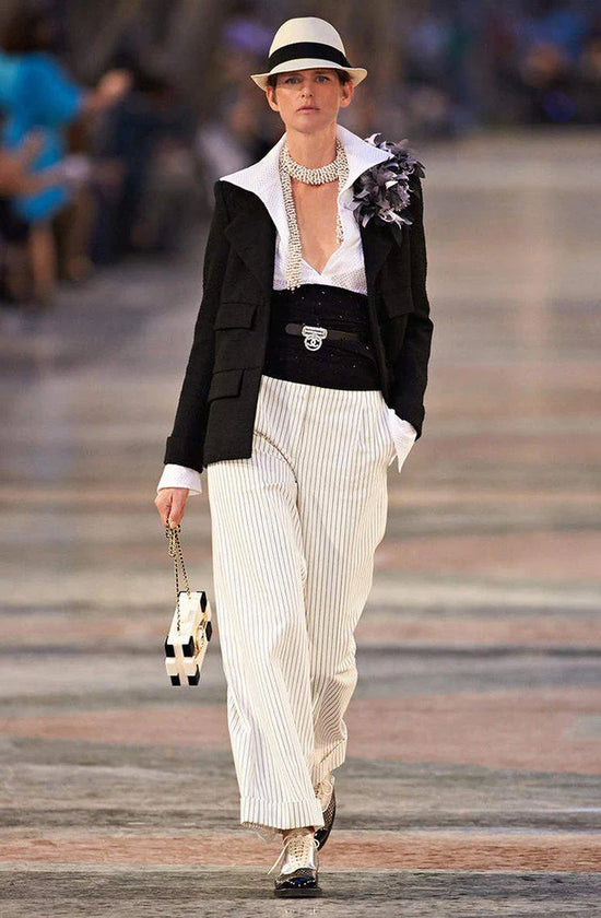 Chanel 2017 Runway Boy Brick Clutch bag made of Lego-style plexiglass, featuring a clear rectangular design with Chanel branding.