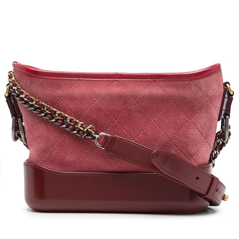 Chanel suede Gabrielle shoulder handbag with gold-tone hardware and signature quilting, featuring a stylish and elegant design.