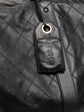 Chanel Diamond Quilted Boston Travel Bag, detail of gold-tone hardware