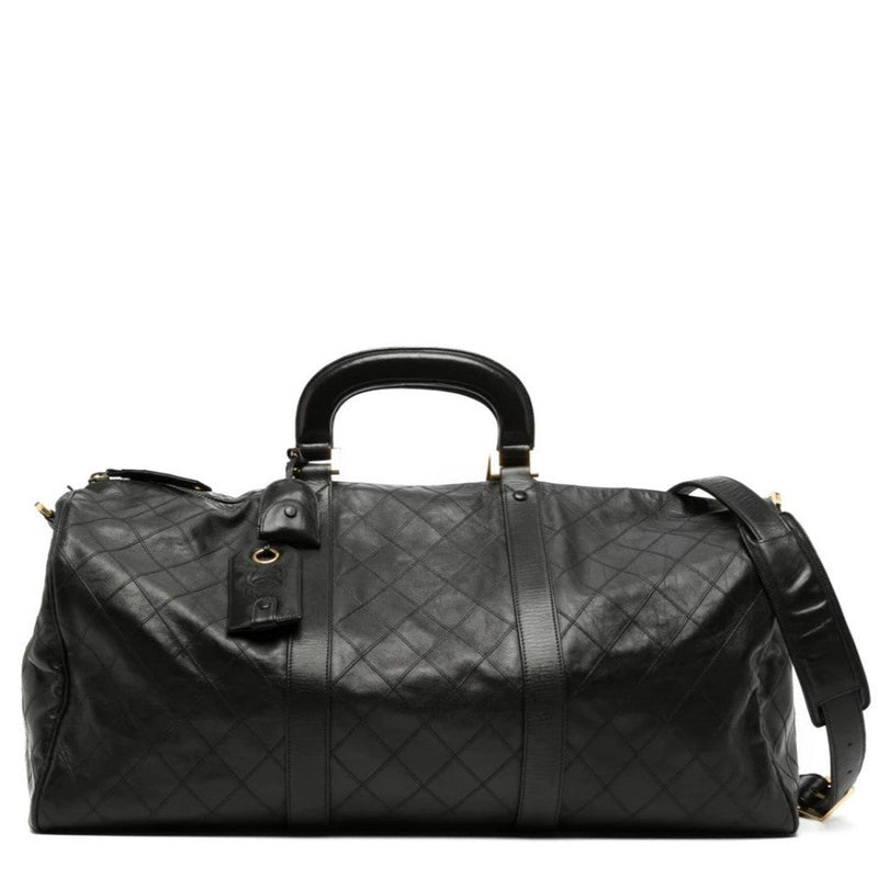 Chanel Diamond Quilted Boston Travel Bag, front view in black leather