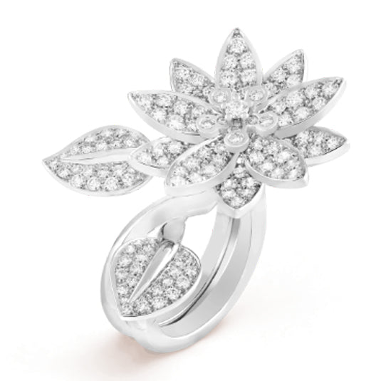Close-up of a Van Cleef & Arpels Diamond Lotus between the finger ring, showcasing intricate design and sparkling diamonds.