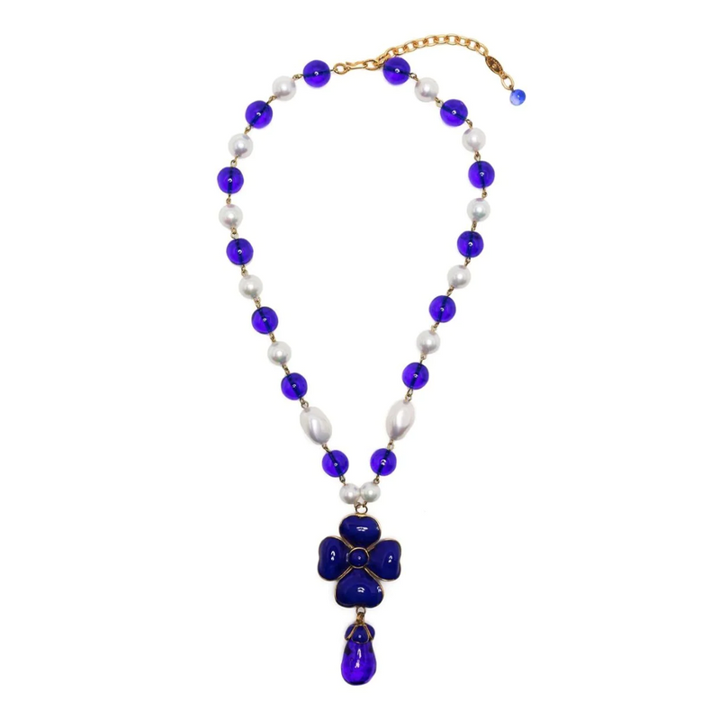 Chanel Gripoix Camellia Pendant Necklace featuring a floral design with colorful glass accents on a gold chain.