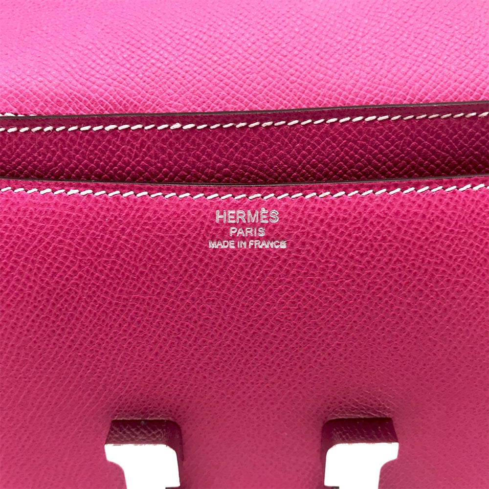 Hermès Tyrien Pink Epsom Leather Constance Elan shoulder bag with gold hardware and structured design.