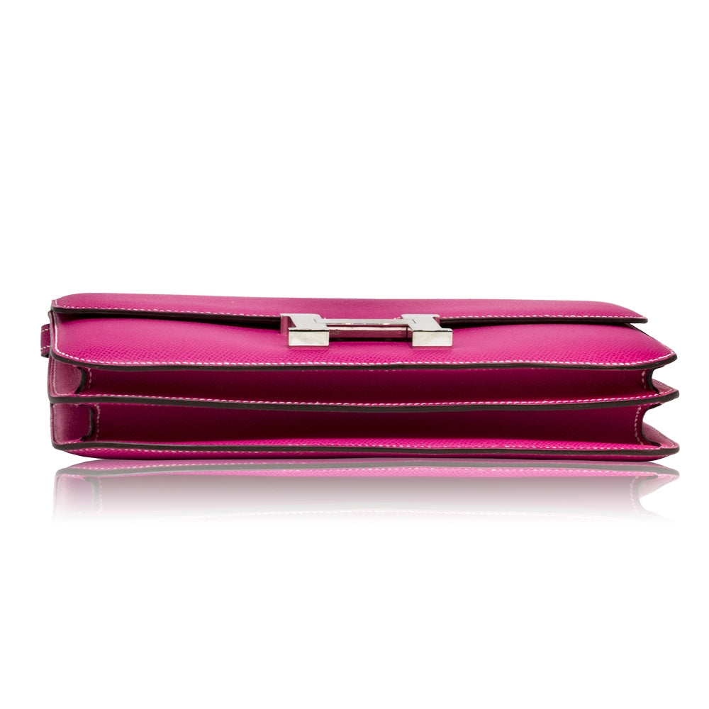 Hermès Tyrien Pink Epsom Leather Constance Elan shoulder bag with gold hardware, showcasing its elegant design and structured shape.