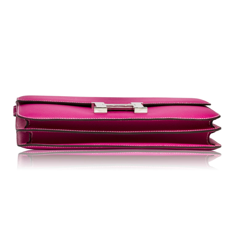 Hermès Tyrien Pink Epsom Leather Constance Elan shoulder bag with gold hardware, showcasing its elegant design and structured shape.