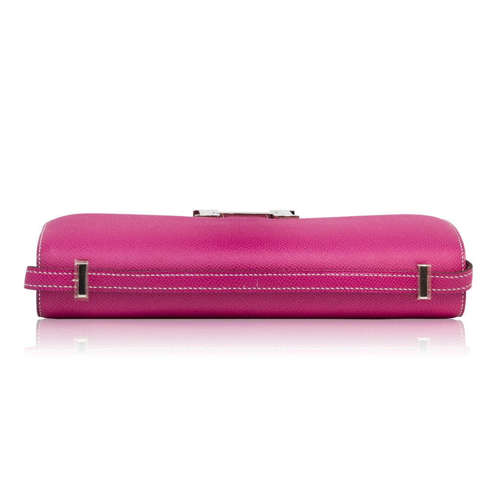 Hermès Tyrien pink Epsom leather Constance Elan shoulder bag with gold hardware and sleek design.