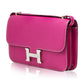 Hermès Tyrien pink Epsom leather Constance Elan shoulder bag with gold hardware and structured design.