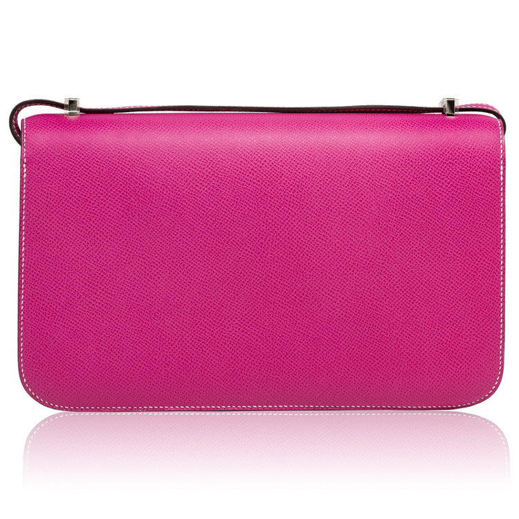 Hermès Tyrien pink Epsom leather Constance Elan shoulder bag with gold hardware and structured design.