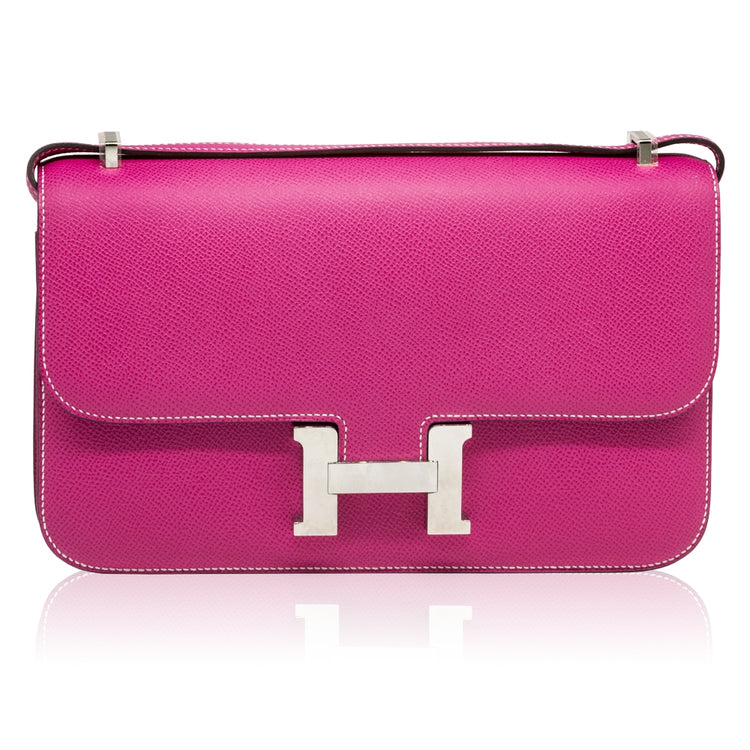 Hermès Tyrien pink Epsom leather Constance Elan shoulder bag with gold hardware, displayed on a neutral background.