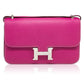 Hermès Tyrien pink Epsom leather Constance Elan shoulder bag with gold hardware, displayed on a neutral background.